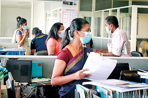 Women in public service awaiting decision on  sarees