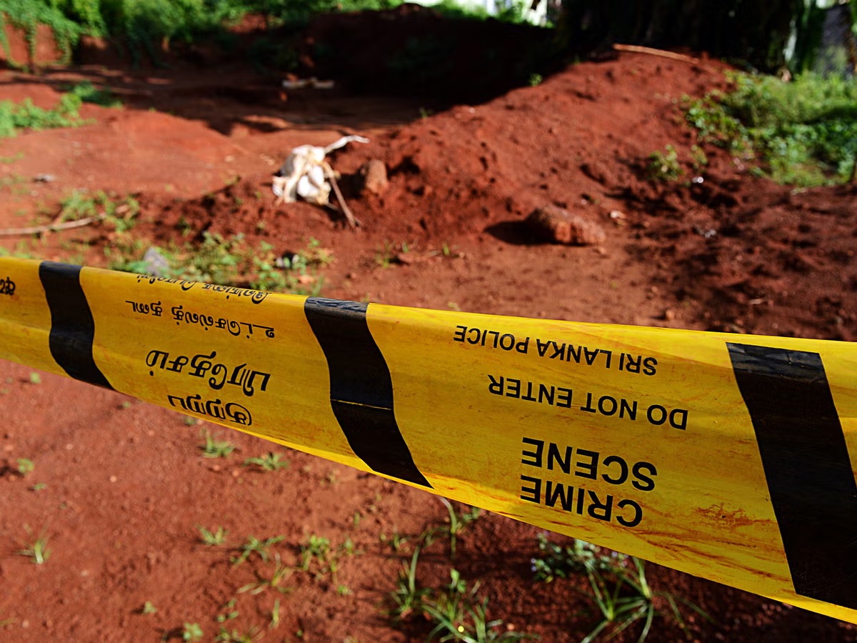  Family Discovers Naked Body at Grave